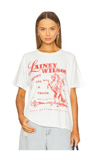 Lainey Wilson Bell Bottom Country Merch Tee in Vintage White | Revolve Clothing (Global)