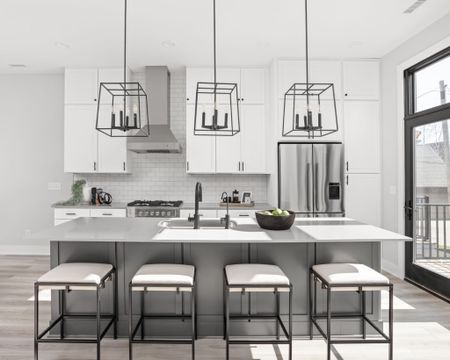 A gorgeous gray and white kitchen! We styled the space using blacks and creams. The stools complement the space perfectly. We love how it turned out!

Styled: Nested Spaces
Built: Estridge Homes
Photography: The Home Aesthetic 

#LTKstyletip #LTKhome #LTKfamily