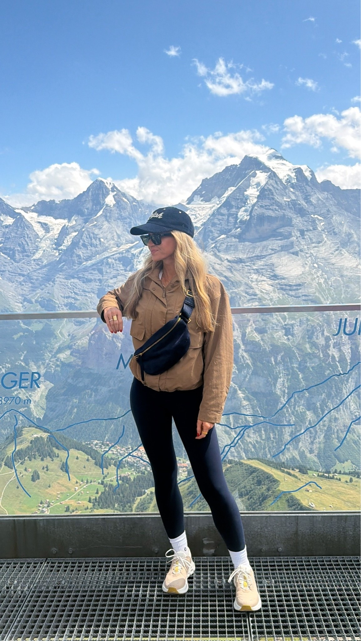 Lovedddd this brown waterproof jacket. A day of hiking in Lauterbrunnen. Brown waterproof jacket: TTS, wearing S Navy leggings: TTS, so good, wearing XS White tank: RESTOCKED! TTS, wearing XS long length Waterproof running shoes: LOVED these, TTS Navy corduroy Ralph hat + Thatch necklace + navy suede crossbody bag.

#LTKootd #LTKdayinmylife #LTKTravel
