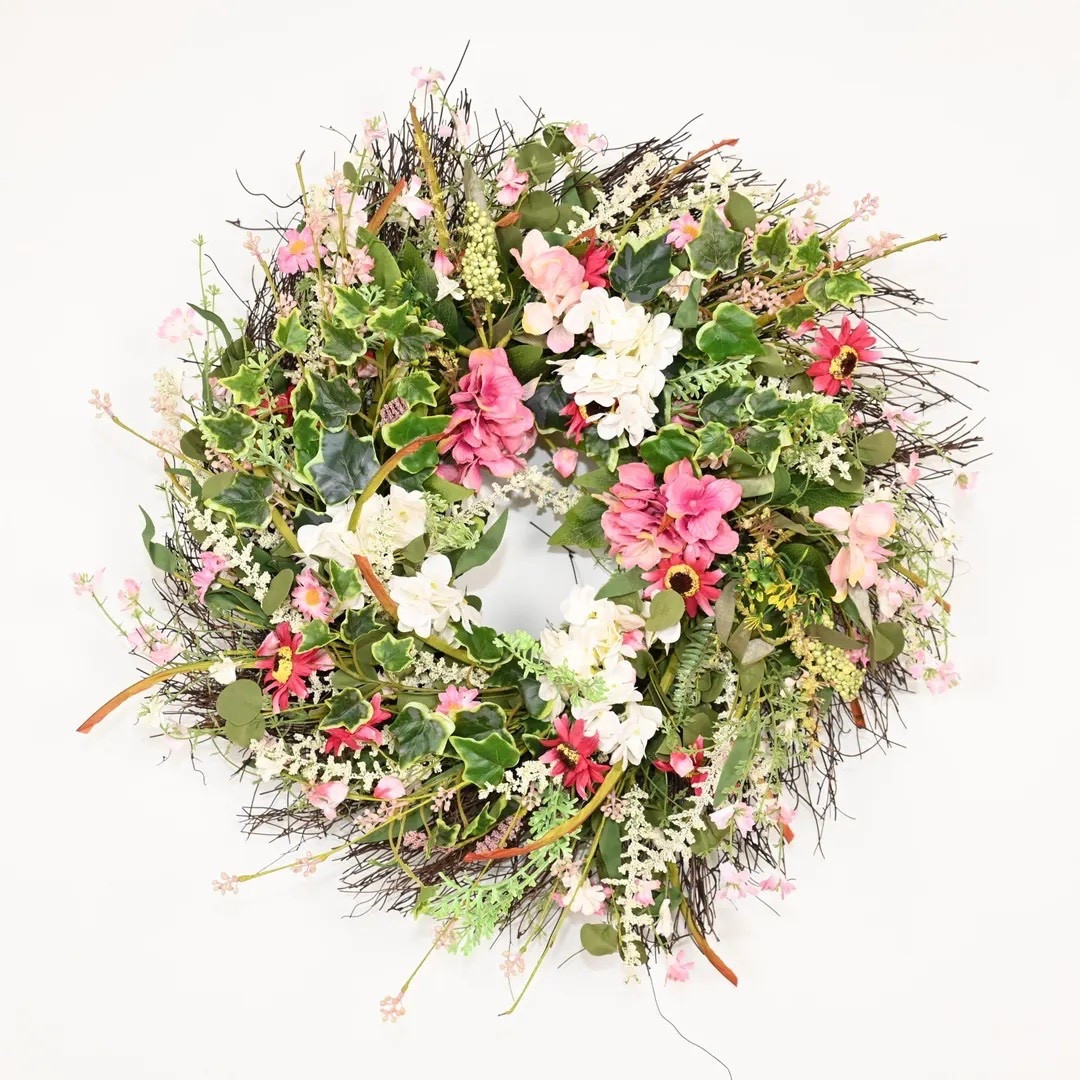Freshen up your front door with this beautifully handcrafted 24” floral wreath featuring soft pink and ivory wildflowers, layered greenery, and natural twig details for that effortless garden-inspired look. The airy, full design adds instant warmth and charm to entryways, porches, living rooms, or fireplace mantels, while the realistic florals give you long-lasting beauty without any upkeep. Perfect for spring, summer, Easter gatherings, Mother’s Day, or everyday decorating, this timeless farmhouse-inspired piece feels both welcoming and elegant. Thoughtfully shipped from North Carolina and gift-wrap ready for easy gifting. 🌸🌿 #LTKHome #SpringDecor #FrontDoorWreath #FarmhouseStyle #CottageDecor #GardenInspired #SeasonalDecor #HomeRefresh

#LTKHome #LTKSeasonal