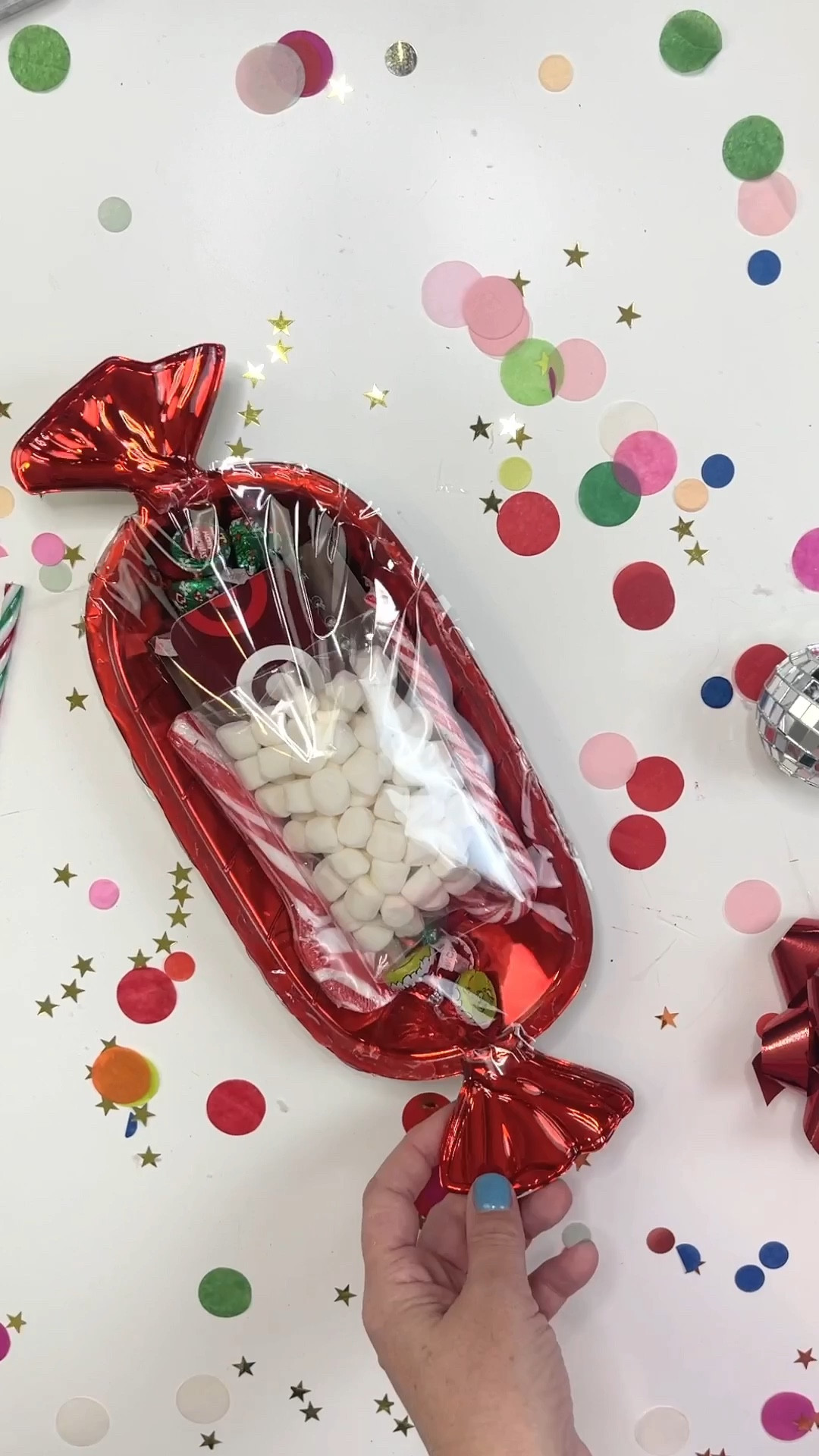 DIY teacher or friend gift idea for the holidays! Grab this cute candy tray from @dollartree and place a mini hot chocolate kit inside with a sprinkling of Hershey’s kisses and a gift card.
Seal it up with some cellophane & hot glue! I’ve put alternative trays in this list!
#teachergift #diyholidaygift #diyteachergift

#LTKHoliday #LTKGiftGuide #LTKSeasonal