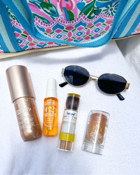 Fun in the Sun beauty products I’m loving! Bronzed shimmery lotion is perfect for your shoulders and arms on a night out. Body spray is a sweet scent with notes of caramel. Translucent powder for your face is SPF 40, has a shimmer. Roll on glitter has SPF 40. Sunnies are a trendy look for less! 

#LTKStyleTip #LTKBeauty #LTKFindsUnder50