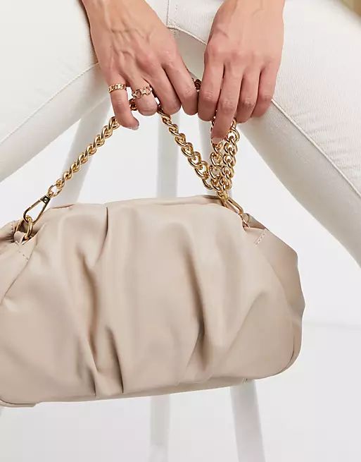 ASOS DESIGN oversized ruched clutch in beige with detachable shoulder chain | ASOS | ASOS (Global)
