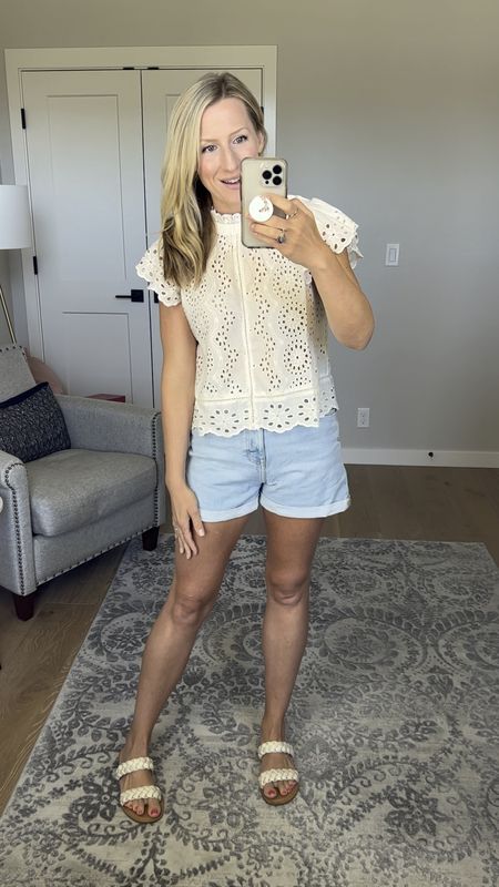 This high neck flutter sleeve eyelet top is perfect for all year round. Dress it up or down! I’m wearing it with H&M mom shorts and braided sandals.

#LTKFind #LTKunder100 #LTKstyletip