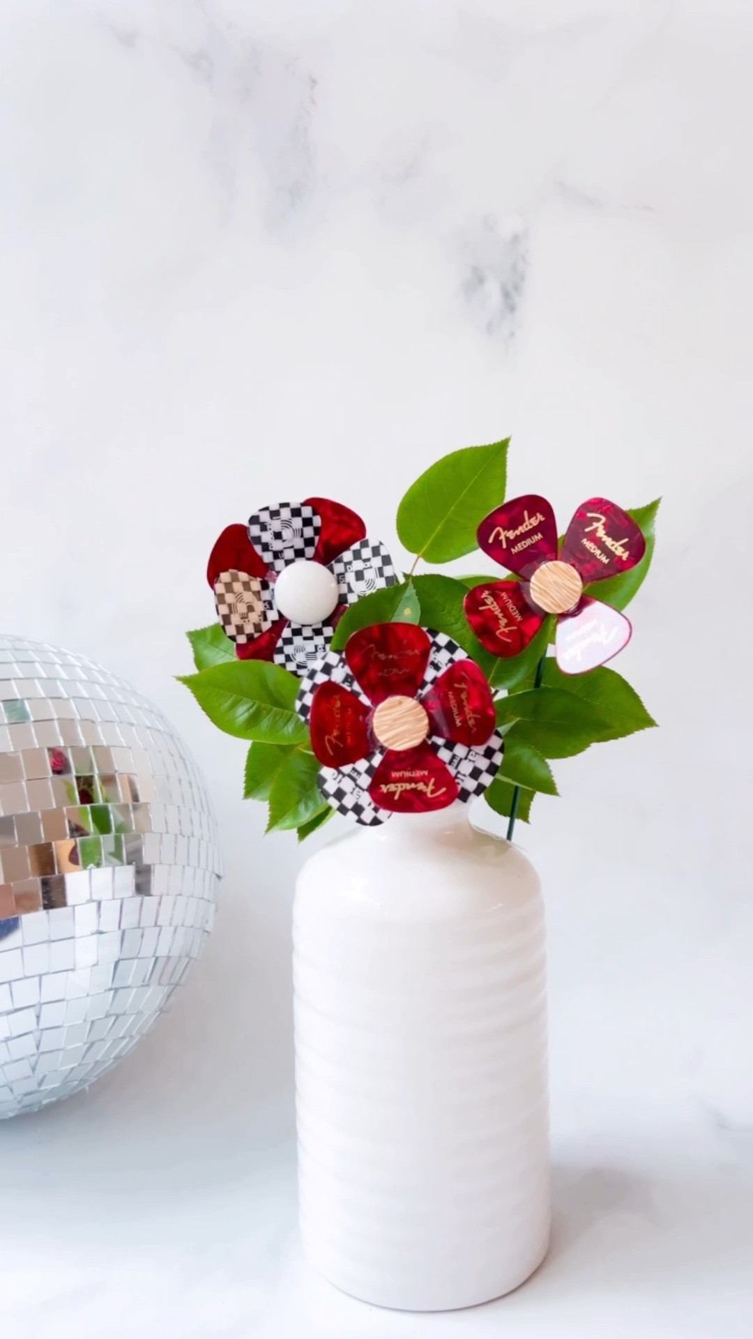 DIY Guitar Picks Flower Bouquet! So easy and simple to make for the rockstar in your life. 🤘🎸 #diy #crafts #musicgifts #giftsfordad #giftsforhusband #giftsformen

#LTKFamily #LTKMens