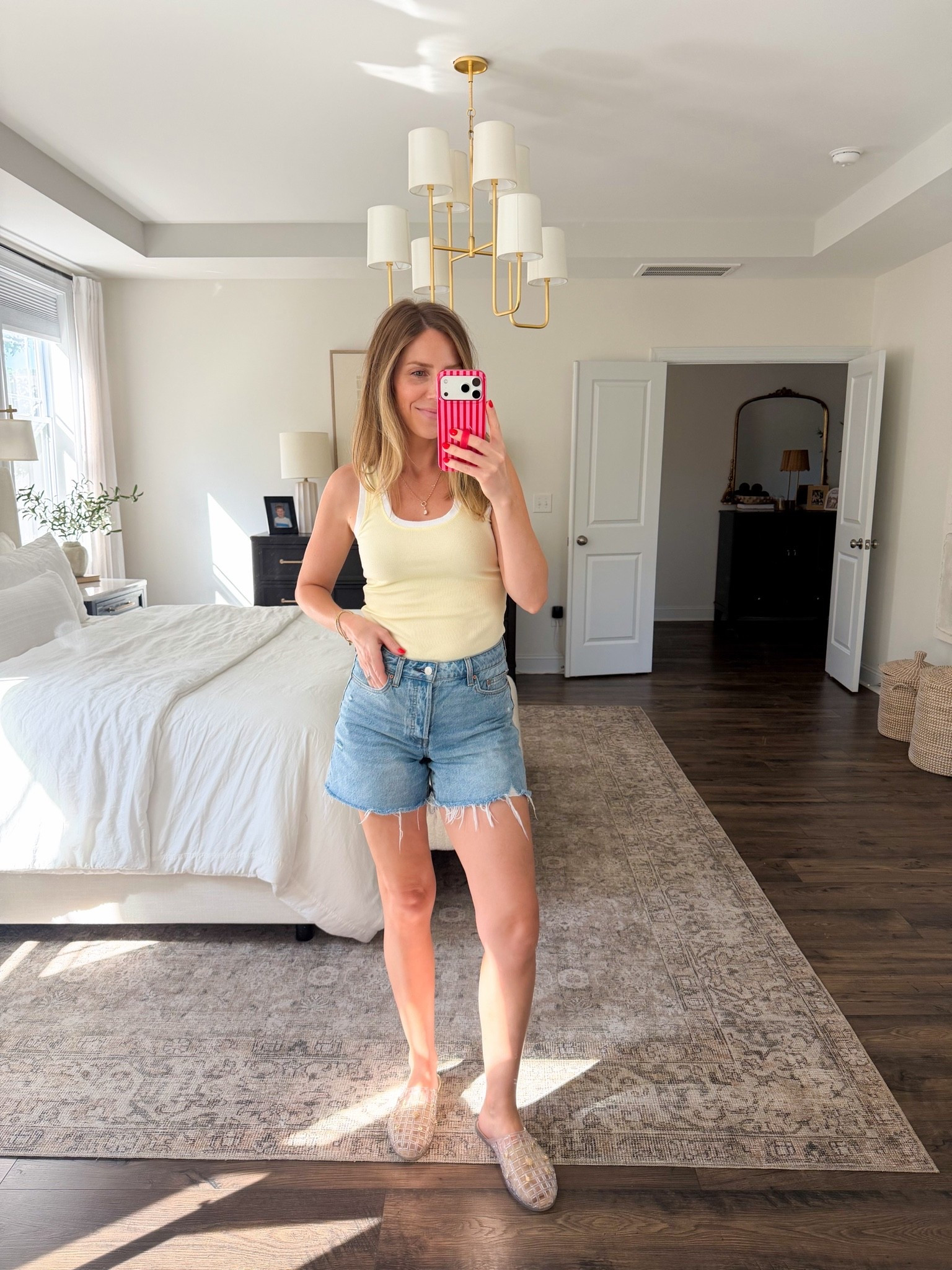 Love the butter yellow of this tank! Went TTS for tank and shorts!