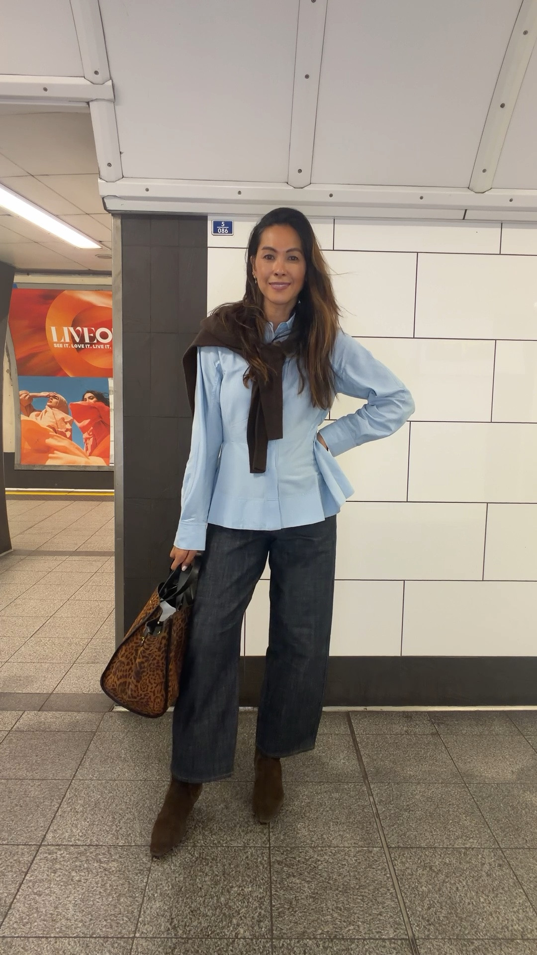Outfit check. What I’m wearing for that in between weather. Peplum shirt ( size 10) with smart casj jeans ( size 8) boots and a cashmere knit - I always size up! Bag is my current fav and jewels are Beaverbrooks - use my code DEBBIE10