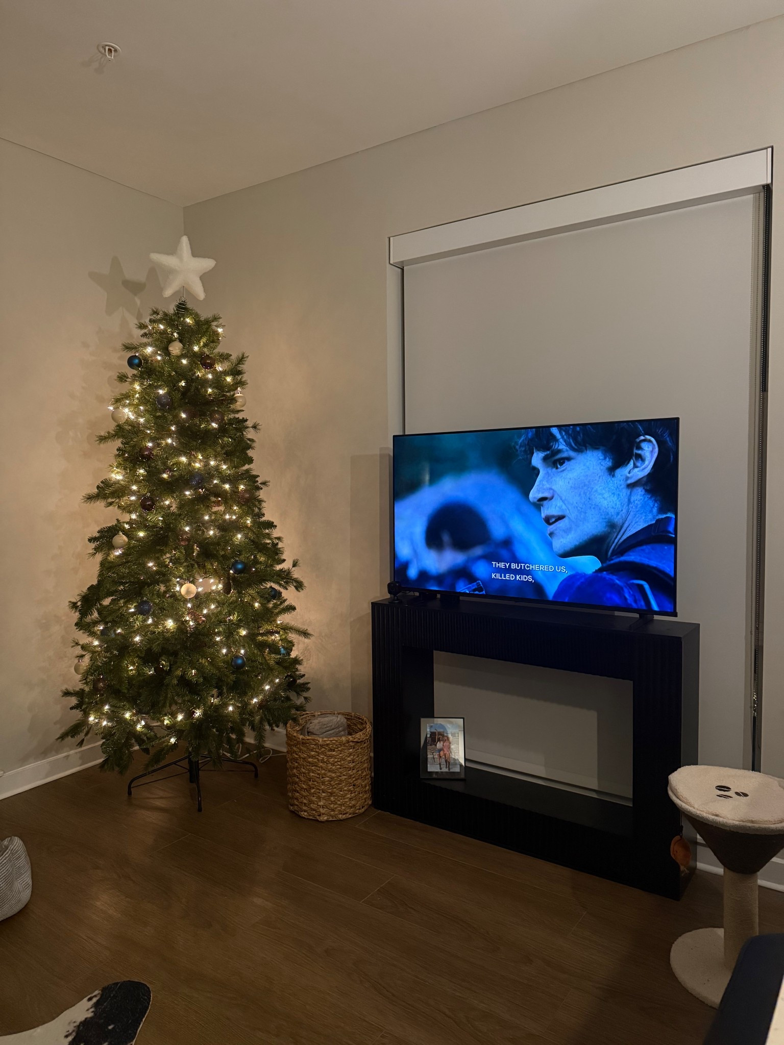 Slowly decorating my apartment! Tv stand is Wayfair (sold out) and basket is TJ MAXX #apartment #christmasdecor #homedecor 