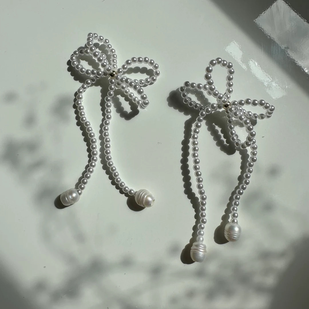 Freshwater pearl bow dangle drop earrings | Etsy (US)