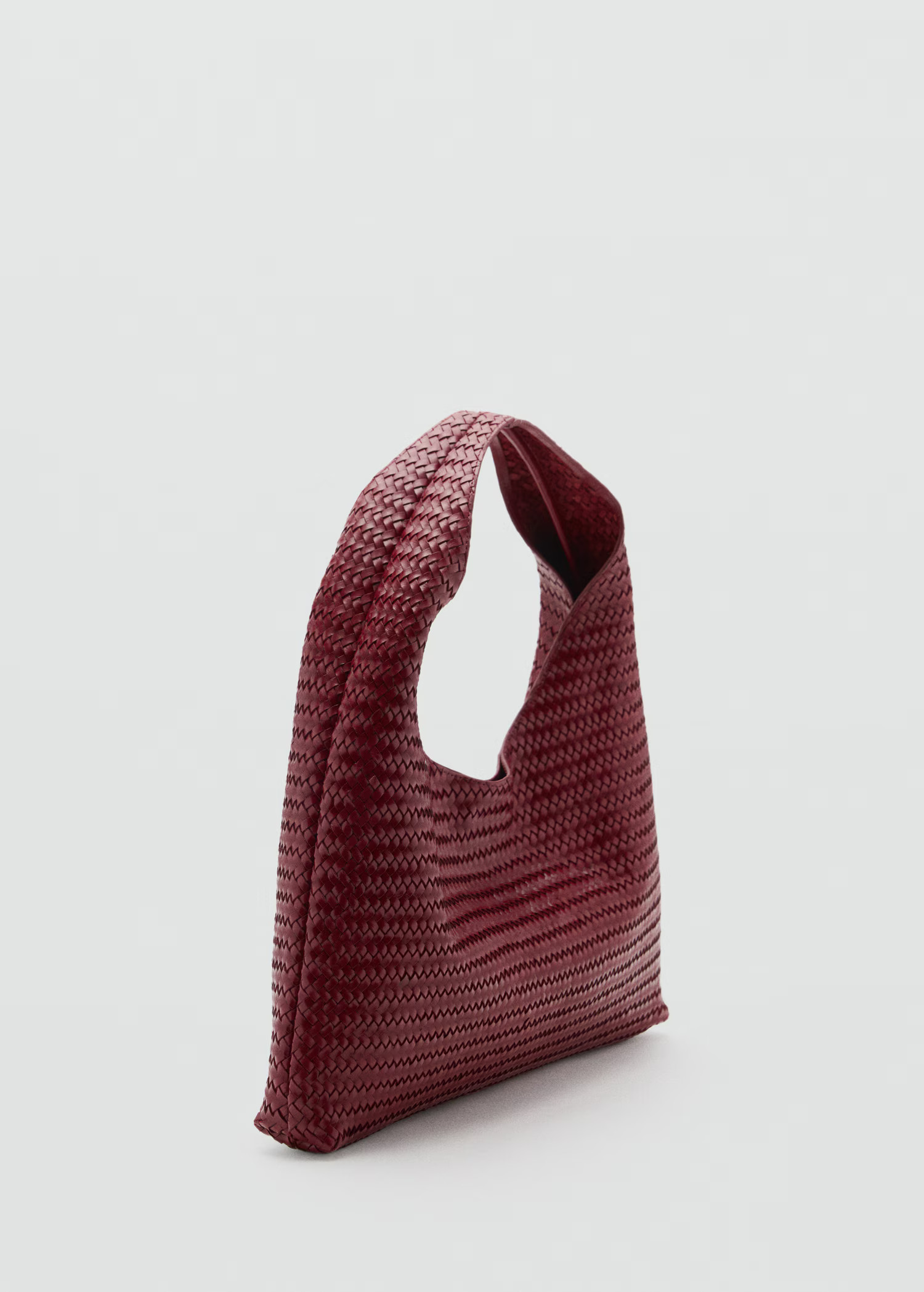 Medium braided leather shoulder bag - Women | MANGO United Kingdom | MANGO (UK)