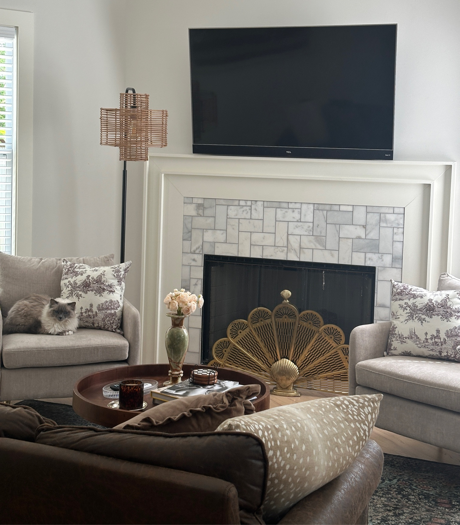 Chic and cozy neutral living room decor.  Traditional with a twist! 

Fireplace screen was an antique find but linked similar. 

#LTKHome