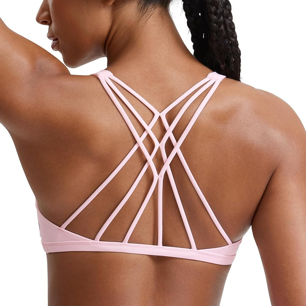 CRZ YOGA Womens Strappy Sports Bra - Criss Cross Back Padded Medium Support Wireless Gym Cami Wor... | Amazon (US)