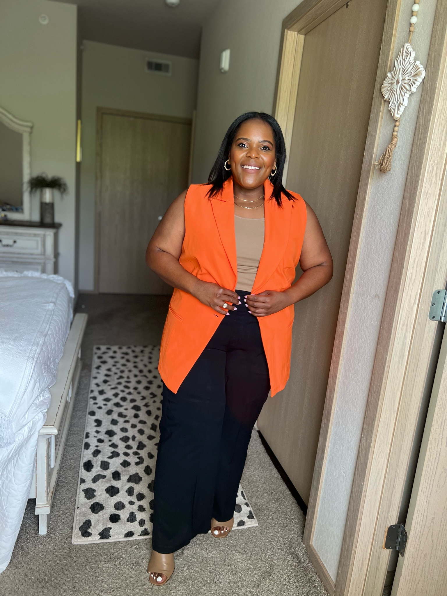 Bright orange sleeveless vest, wearing a size XL. 

#LTKunder50 #LTKworkwear #LTKstyletip