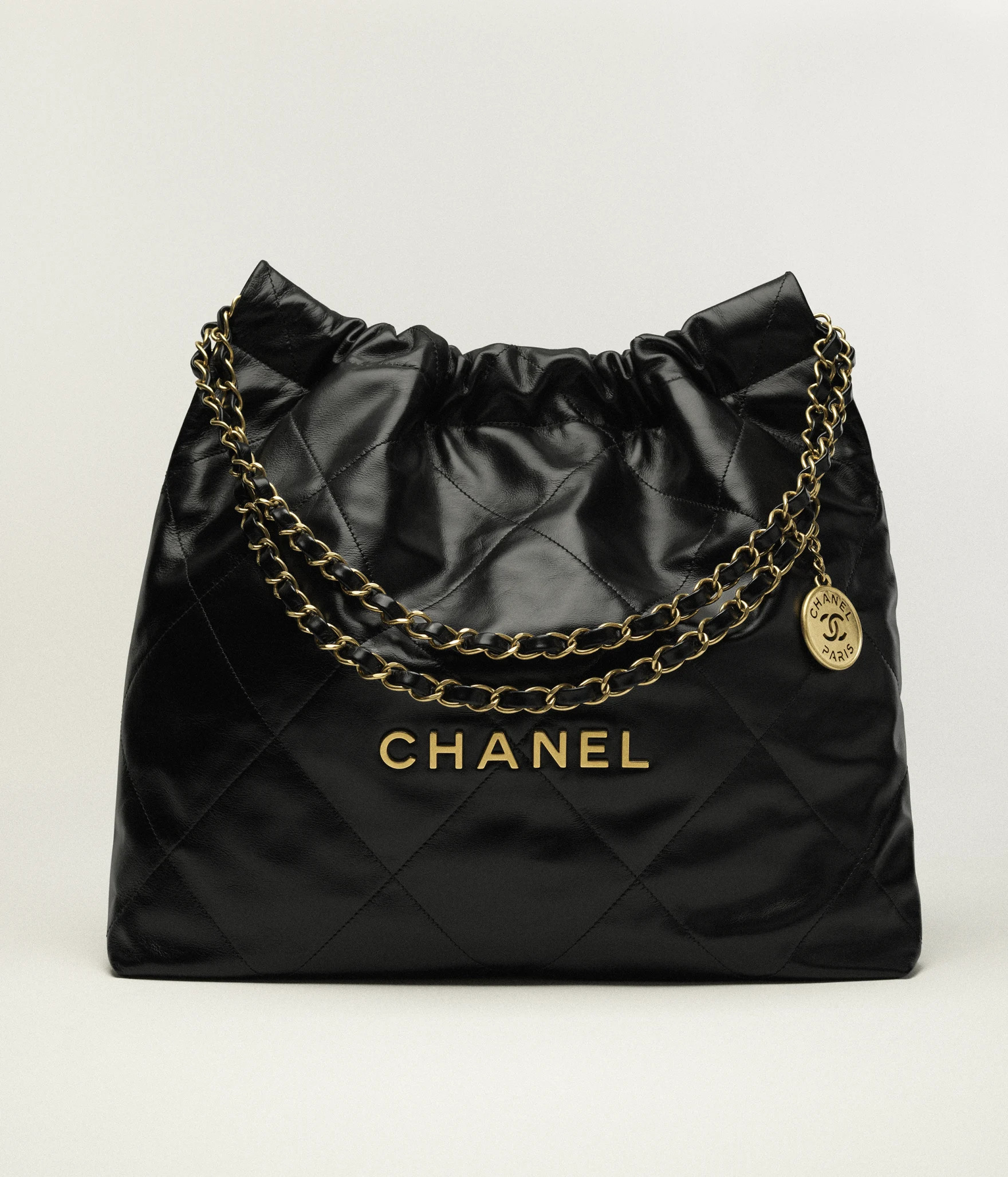 Chanel 22 handbag, Shiny calfskin & gold-tone metal , black — Fashion | CHANEL | Chanel, Inc. (US)