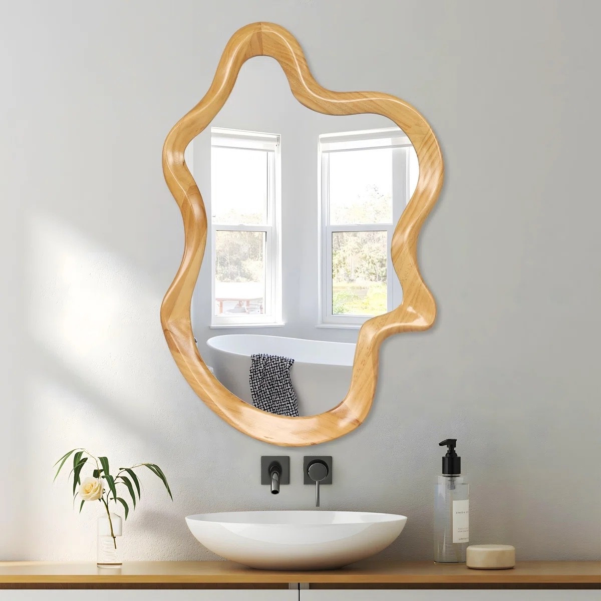 Organic modern mirror moment 🤍
This irregular wood-framed wall mirror adds the perfect soft, sculptural touch to bathrooms, entryways, or living spaces. Currently on sale at Wayfair ✨ I’ve tagged the exact mirror shown, and you can also browse similar organic mirrors and budget-friendly alternatives through my links.

#LTKSaleAlert #LTKHome