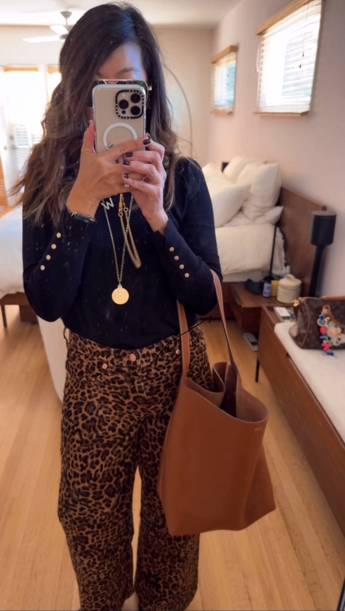 Fall/Winter will always be my favorite… the browns, the cozy layers, all of it 🍂🤎 Even with work being nonstop, at least the outfits stay fun!

Today’s look has my fave pop of leopard and my new squishy-soft tote (total The Row vibes 😍). 

#LTKOver40 #LTKCyberWeek #LTKootd