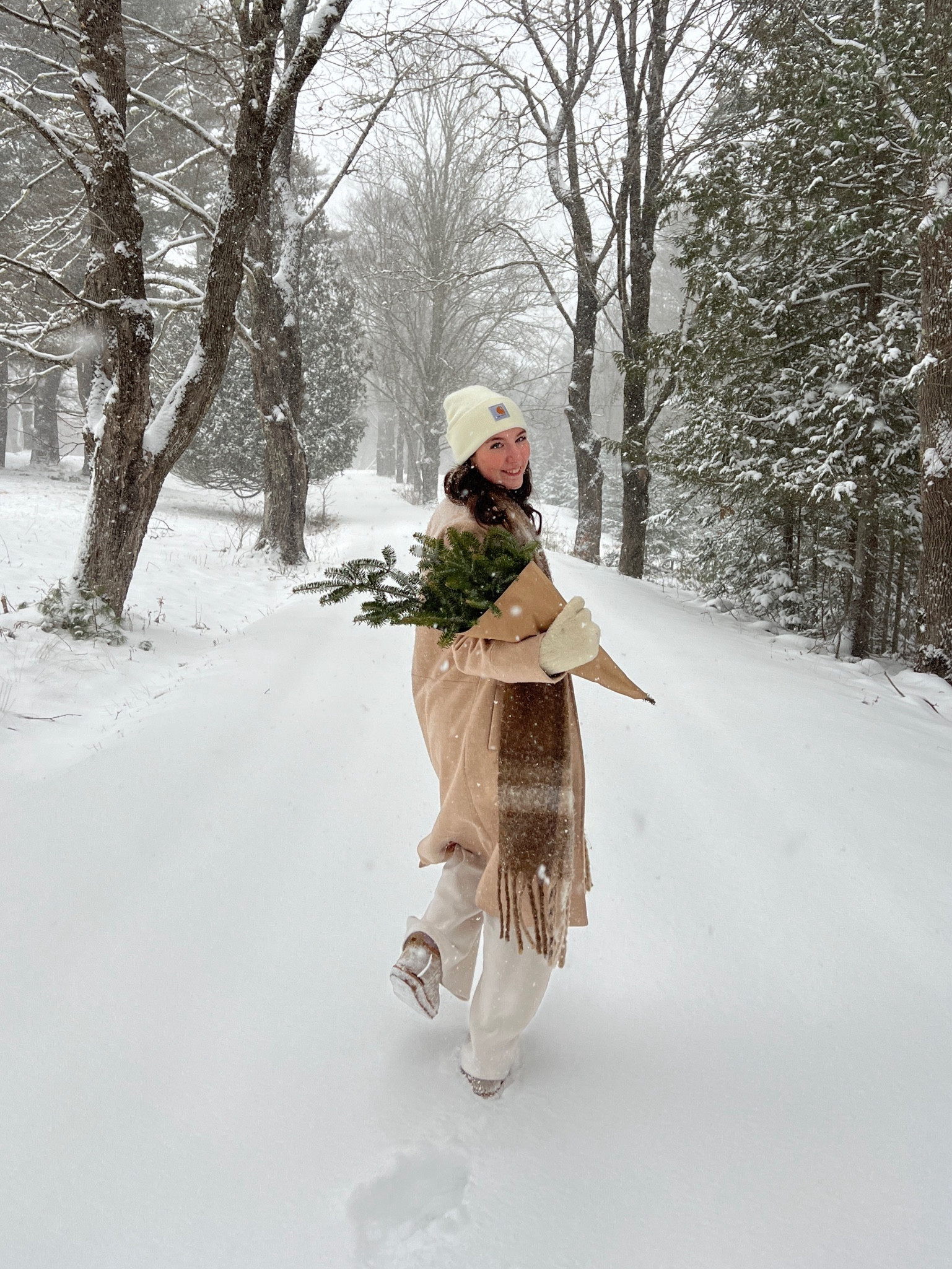 Snow day winter outfit with cream colored beanie, long plaid scarf, cream matching lounge set, ugg boots, and long tan wool coat. Snow day aesthetic, winter outfit inspiration 

#LTKfindsunder100 #LTKSeasonal #LTKtravel