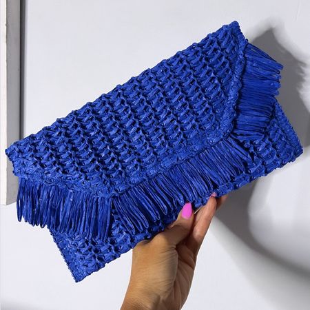 Blue straw clutch - comes in variety of colors 



#LTKSeasonal #LTKitbag #LTKfindsunder50