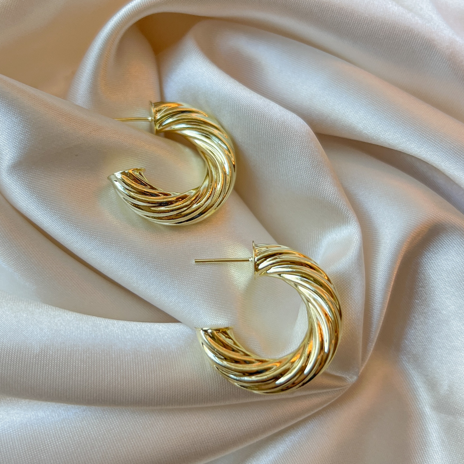 NEW Firenze Hoops from Sheila Fajl! Use code OLIVIA for 15% off your entire order. Small lightweight gold twisted hoop earrings. Hypoallergenic. 18k gold plated. 

#LTKGiftGuide #LTKfindsunder100 #LTKover40