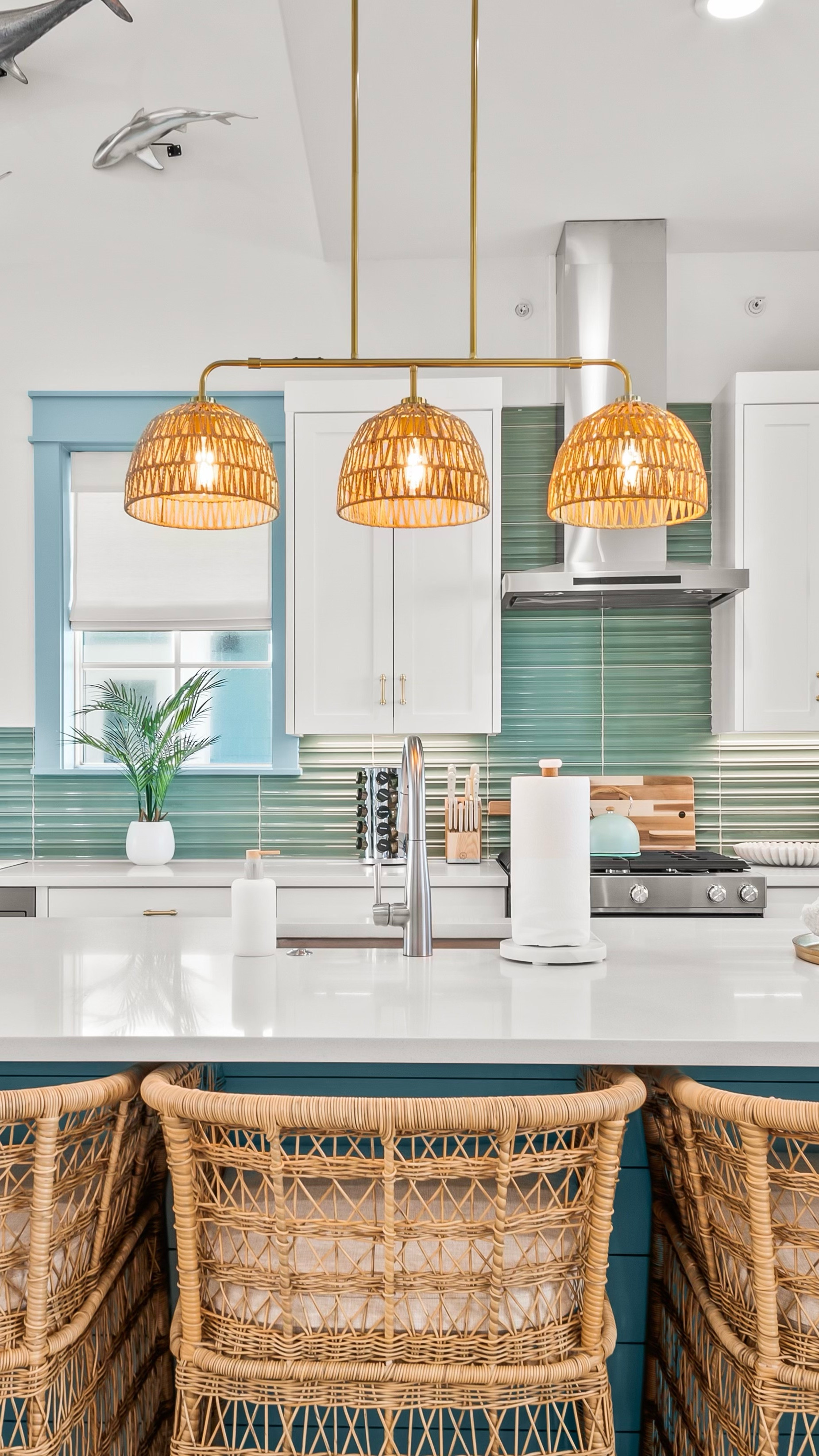 Coastal kitchens should feel like a deep breath in. 🌊 Ocean views? Check. Light that dances through the space? Check. Barstools and light fixture from wayfair + a ruggable rug that’s ready for sandy feet! Effortless, livable, and made for the view. 🌴
#interiordesign #kitchen #kitchendesign 

#LTKHome #LTKSummerEdit #LTKSeasonal