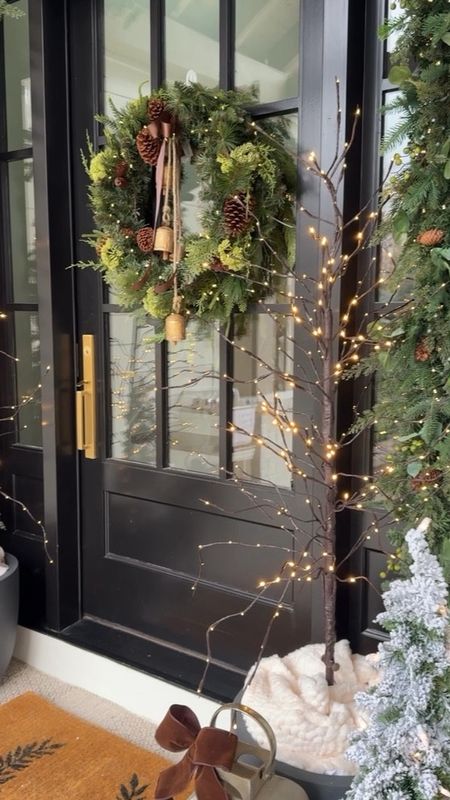 My 2023 holiday porch styling is complete!  I love this simple yet elegant style!  Everything, except the lanterns are in stock!  I linked very similar lanterns here.

Pottery Barn, Frontgate, McGee & Co Amazon home decor

#LTKsalealert #LTKHoliday #LTKVideo