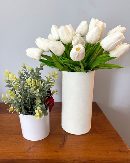 Faux greenery from Amazon and target! Small boxwood with white pot from Target and faux tulip stems that are super realistic from Amazon! White vase was a diy but I will link similar options!

#LTKunder50 #LTKunder100 #LTKhome