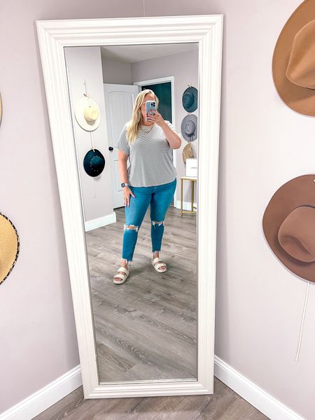 These stretchy and comfy fit tees are so good and such a great price! I love this small striped version but they also have solid colors. My favorite jeans styled for summer with some cute sandals. The jeans come in regular and plus sizes as well as multiple lengths. 

Sizing: 
Tee: 2X 
Jeans: 35L - Size 18 Tall
Sandals fit TTS

Casual jeans outfit 
Plus size jeans
Plus size summer outfit 
Plus size casual outfit 
Striped tee
Summer outfit 
Sandals 
Summer shoes



#LTKPlusSize #LTKOver40 #LTKShoeCrush