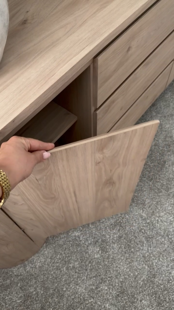 A closer look at this wood storage piece and the details make such a difference. The warm wood tone, clean lines, and streamlined design give it that high-end look while still feeling practical for everyday living.

I linked this piece so you can take a closer look and recreate a similar warm, modern organic feel in your home.
@Wayfair

#LTKU #LTKSaleAlert #LTKHome