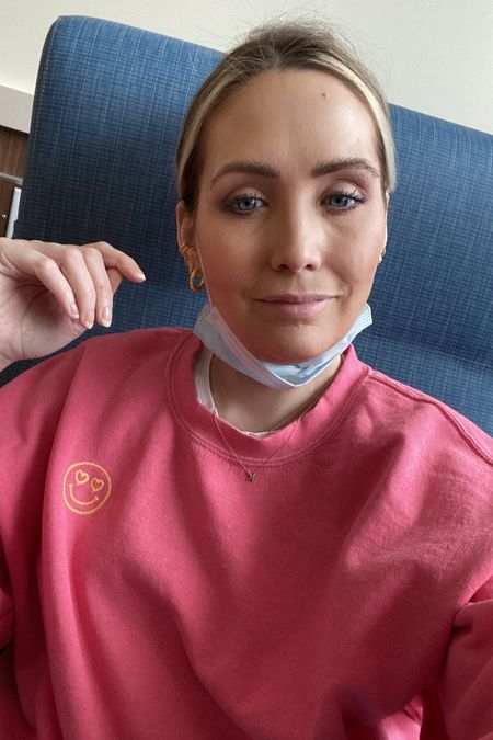 Infusion days always call for comfy warm clothes bc you’re sitting in car, then in the clinic where it gets chilly! This sweatshirt is a perfect bright pink w/ a smiley 😍 face! It’s super comfy & def a great option to have for spring/summer cool evenings or traveling!

I’m wearing the size S/M

#LTKunder100 #LTKtravel #LTKFind
