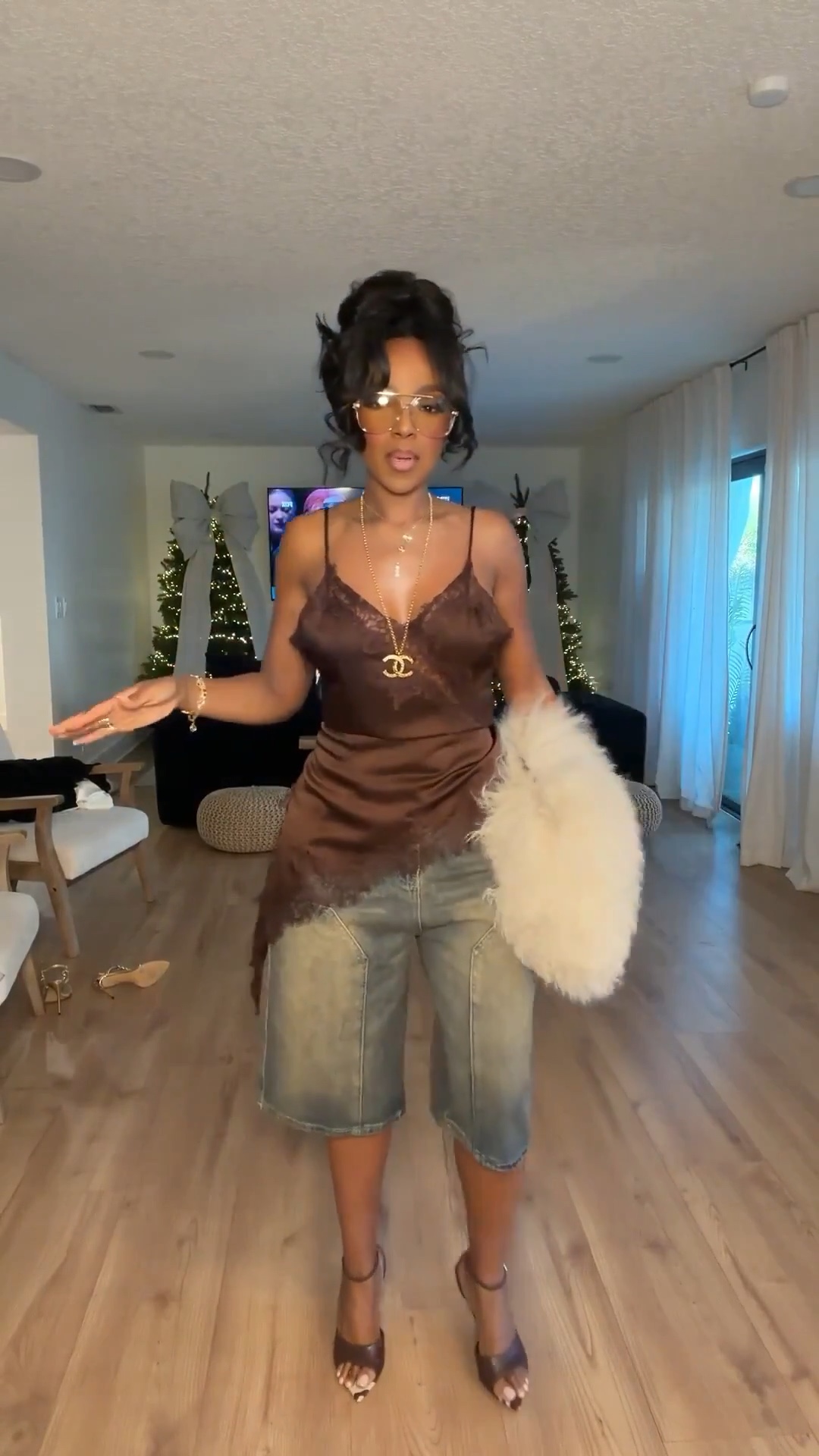 A playful mix of textures that instantly feels editorial — the satin lace-trim dress layered with denim bermuda shorts creates such a cool, unexpected silhouette. The rich chocolate tone adds warmth and depth, while the oversized fluffy bag brings that fun statement moment that ties it all together.

It’s the kind of look that blends feminine softness with laid-back denim for a vibe that’s effortless, stylish, and full of personality.

Perfect for creative daytime plans, fashion-forward outings, and elevated casual styling.

📏 Sizing: Small  
Height — 5’4”  
138 lbs  
Bust — 34D  
Waist — 27”  
Hips — 40”  
For pants/jeans: 27 Long or 4 Long

Save this post

Satin and denim styling, chic layered looks, creative outfit ideas, chocolate brown tones, fluffy statement bags, elevated everyday fashion with personality.

Follow me on Instagram and YouTube @kirasfashionfinds

Follow my LTK @kirasfashionfinds on the @shop.LTK app to view this post and get my exclusive app-only content!

#liketkit #LTKootd #LTKvlog #LTKgrwm
@shop.ltk
https://liketk.it/5GFAO