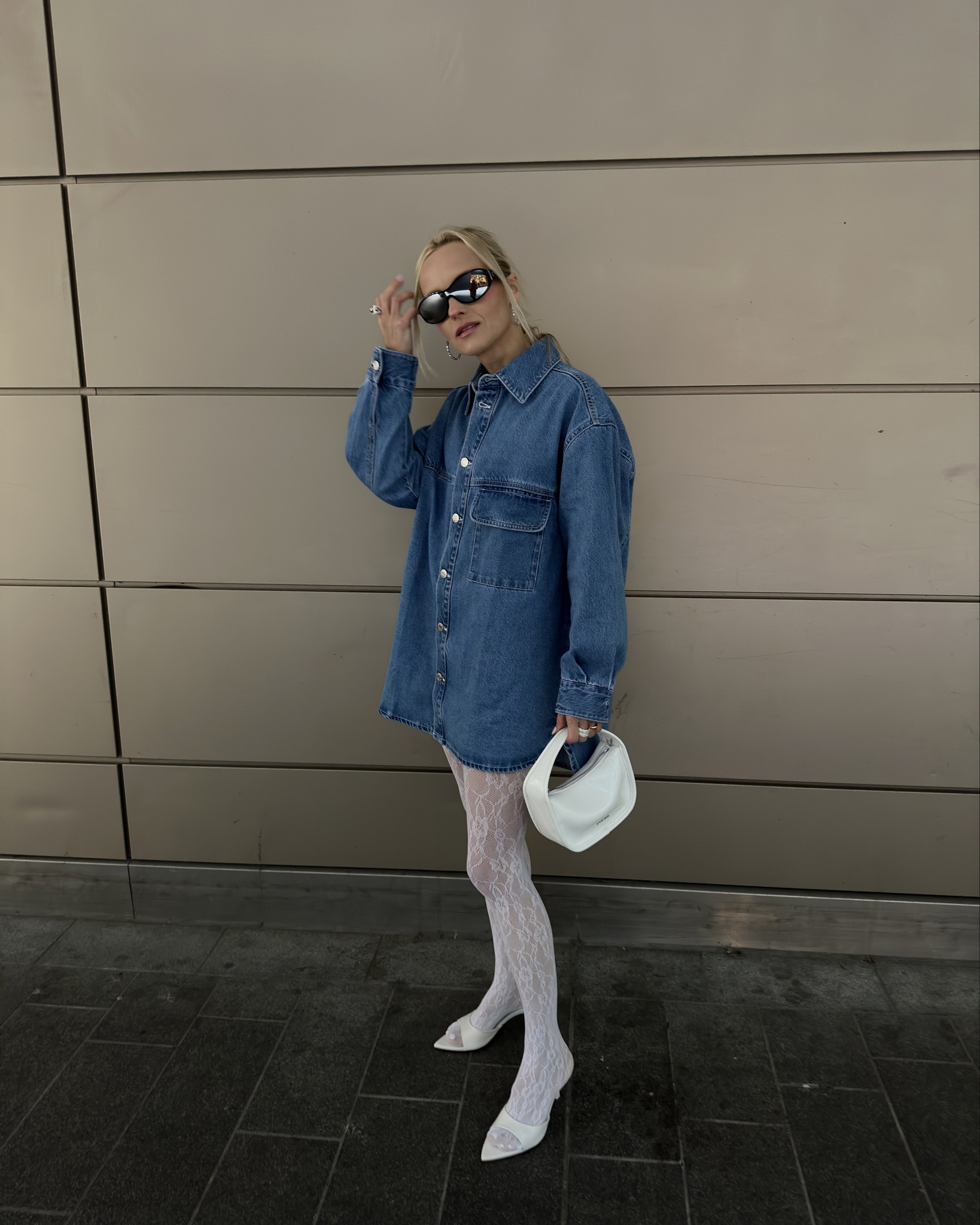 Wear denim with sophistication!!
One of my favourite denim shirts which I got recently, love wearing denim in sophisticated way and this oversized shirt I styled with white details to lift the perfect blue colour. 

Cettire denim hair scrunchie, Chanel mirrored lenses sunglasses, Swarovski crystal hoop earrings, Bershka denim oversized shirt, Staud white patent bag, Mango lace hite tights, Zara open toe mule heels. 

#LTKstyletip #LTKeurope #LTKSeasonal