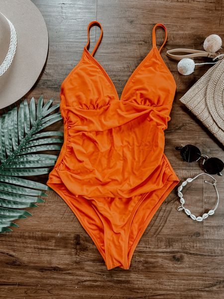 Amazon one piece bathing suit. Orange one piece swim suit. Flattering tummy control. Wearing medium fits TTS! 

#LTKSeasonal #LTKswim #LTKtravel