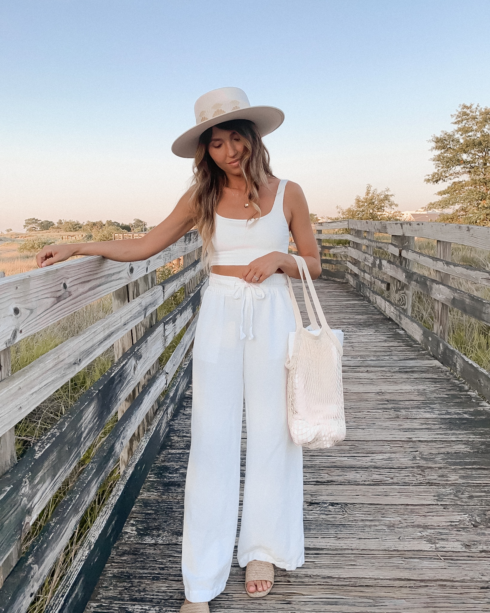 Vacation / beach outfit - cropped tank top, white wide leg beach pants, rattan sandal slides, seashell boater hat // vacation outfit, vacation outfits, beach outfit, resort wear, vacay, beach, pool, summer outfit, summer outfits, beach pants, neutral style, linen, travel outfit 
#ltkstyletip
#ltkunder100
#ltkseasonal
#ltktravel


#LTKunder50 #LTKswim #LTKFind