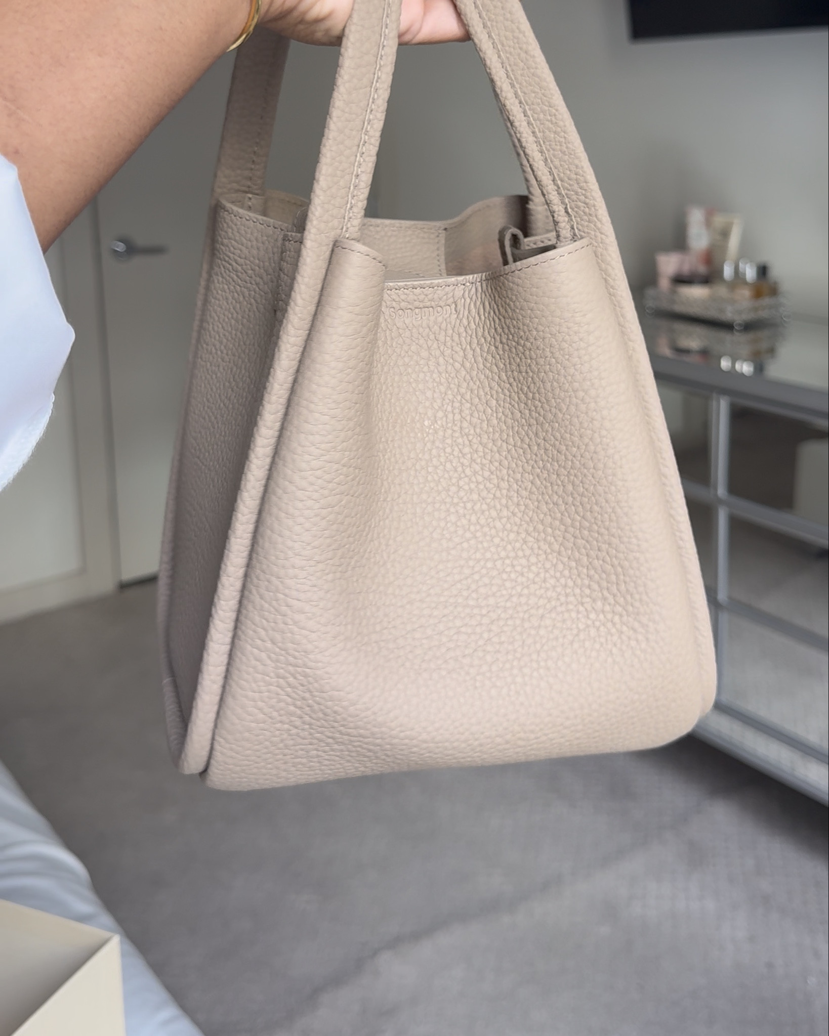 This Songmont bag is second to my collection of real leather bags under $500. This one is the medium song bag in cream apricot. I’ve fallen in love with tumbled leather and an everyday color 😍

#LTKStyleTip
