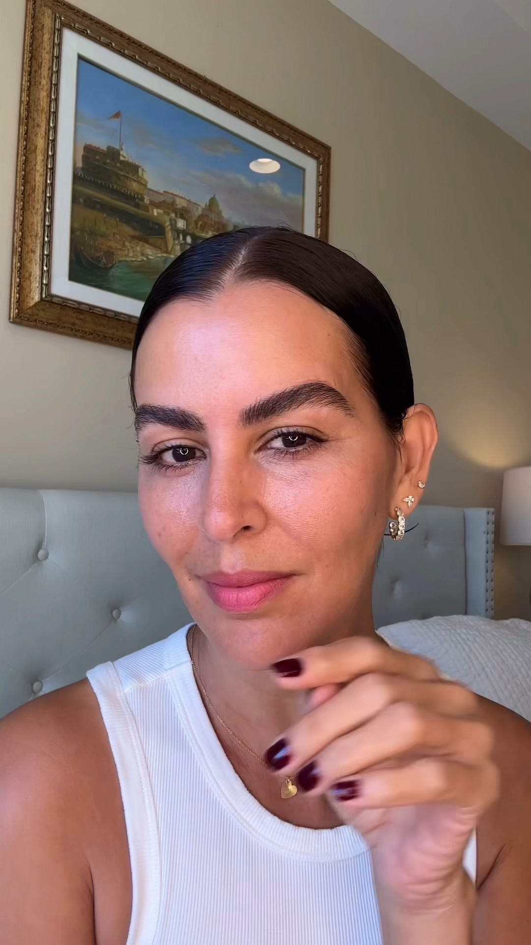 Clear brow gel and brow pencil in dark brown. Nail polish in 479