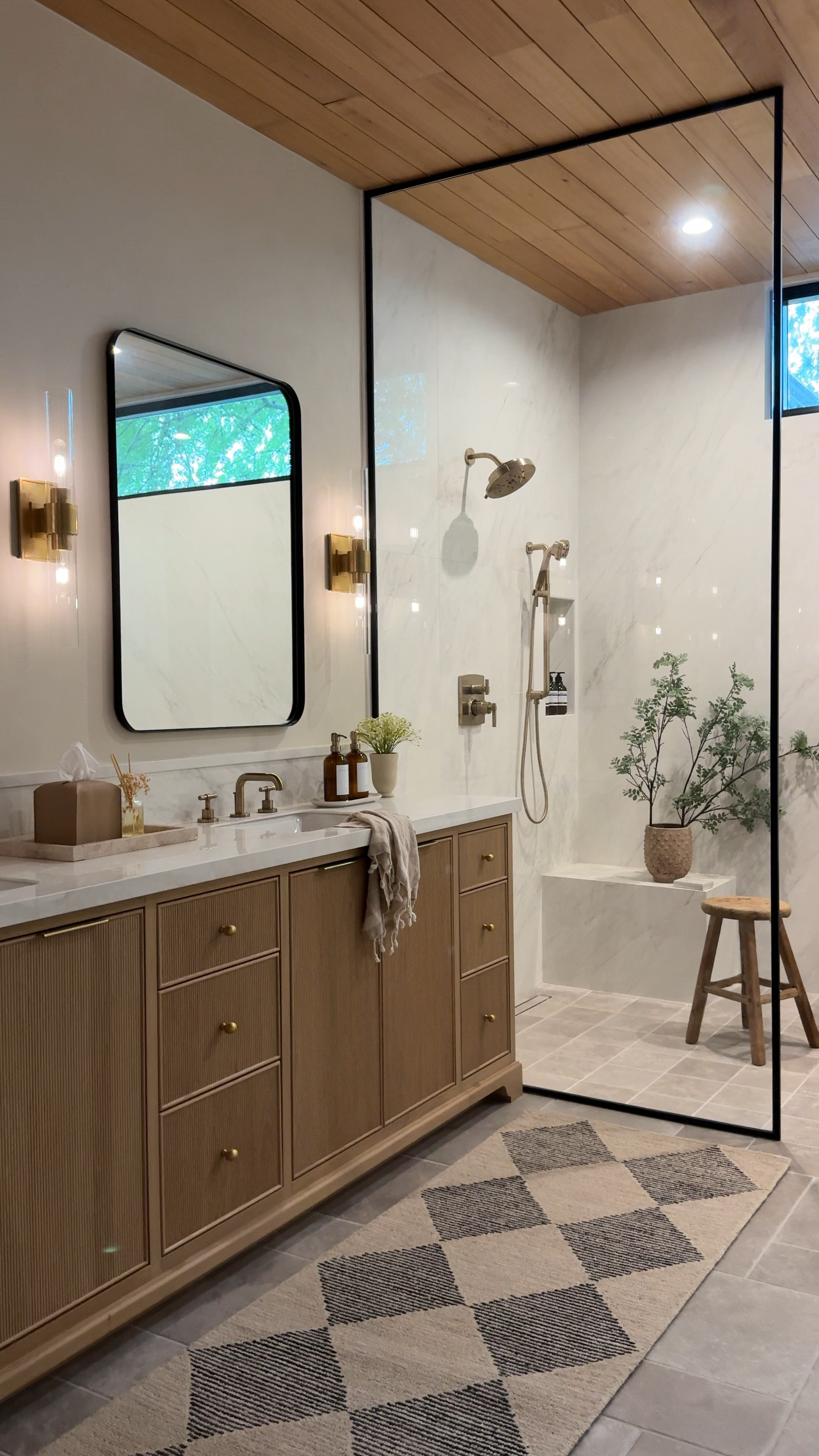 Styling decor in our bathroom 

Wayfair visual comfort Brass sconce black mirror shower bathroom design brass faucet brass hardware Wayfair stool base bath brass knob wood stool soap pump tissue towel shower faucet 

#LTKhome #LTKfindsunder50 #LTKsalealert