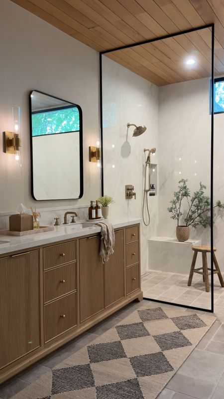 Styling decor in our bathroom 

Wayfair visual comfort Brass sconce black mirror shower bathroom design brass faucet brass hardware Wayfair stool base bath brass knob wood stool soap pump tissue towel shower faucet 

#LTKhome #LTKfindsunder50 #LTKsalealert