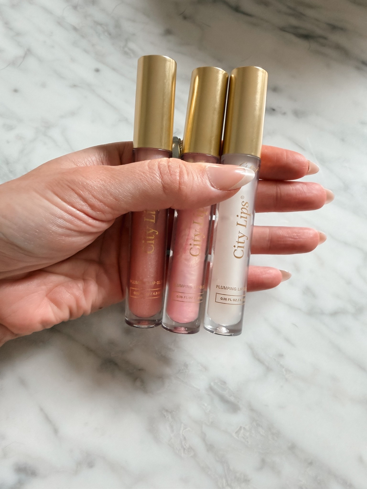 Been loving these City Lips Plumping Glosses. My favorite shade is Tinsel Town.

#LTKgrwm #LTKOver40 #LTKBeauty