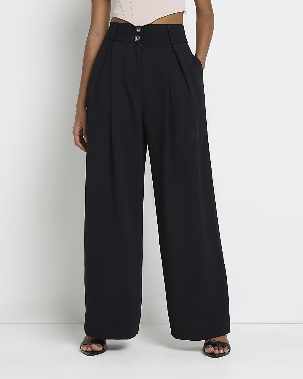 Black wide leg pleated trousers | River Island (UK & IE)