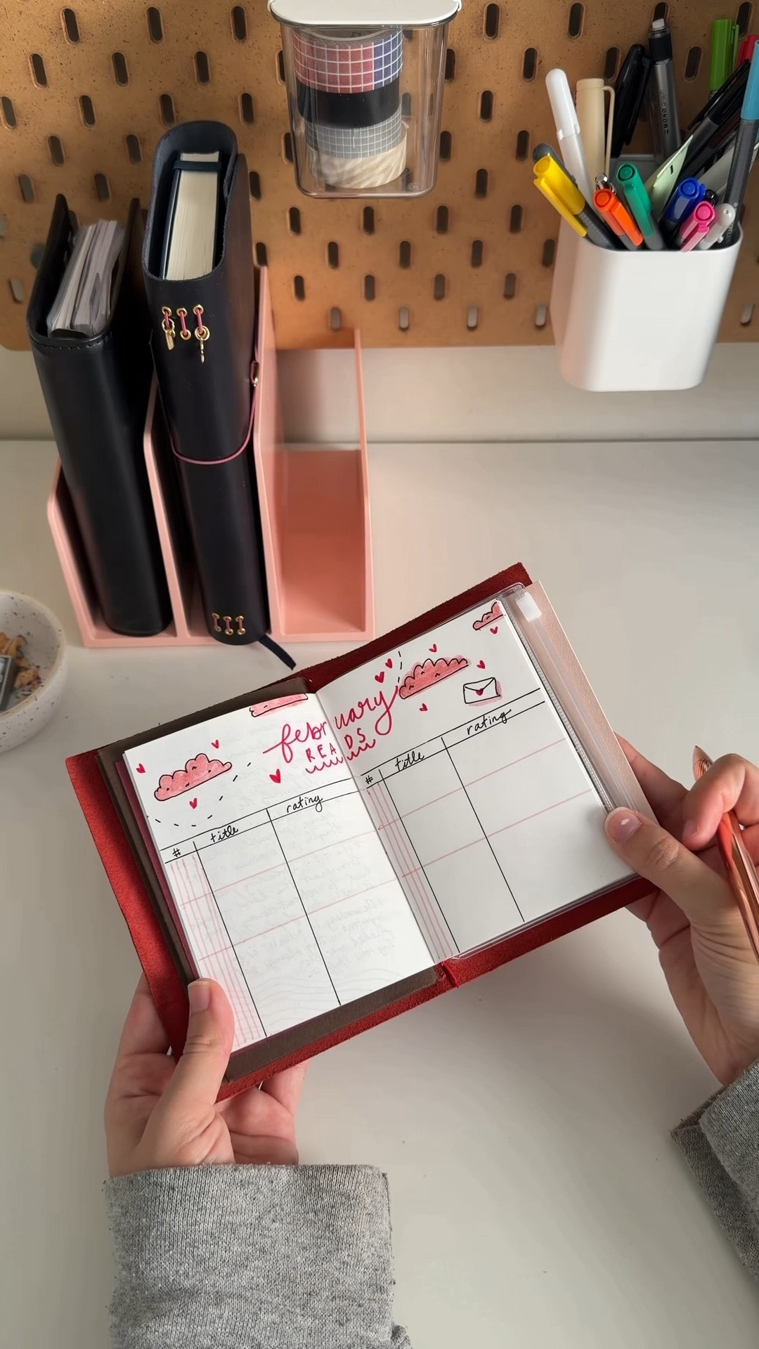 giving my reading journal a little sparkle for February 💕✨

the great thing about this passport-sized notebook is that I can be playful with my spreads without it taking 30+ minutes to setup! Within 10 minutes of opening a blank page, I had a new reading tracker ready to go for the month!

I have a few books I’m really excited to tackle this month, so stay tuned for that :)

#readingjournal #journalsetup #leatherjournal