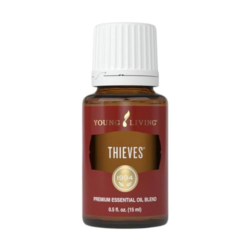 Young Living Thieves Essential Oil Blend 15 ml | Supports Immune System & Cleansing | Clove, Lemon, Cinnamon Bark, Eucalyptus Radiata, Rosemary | 100% Pure Therapeutic Grade perfect for a hair oil | Amazon (US)