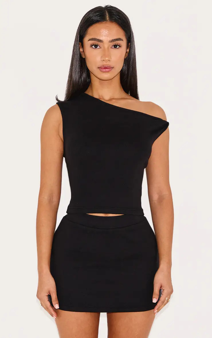 Petite Black Ribbed High Waisted Mini Skirt | PrettyLittleThing US