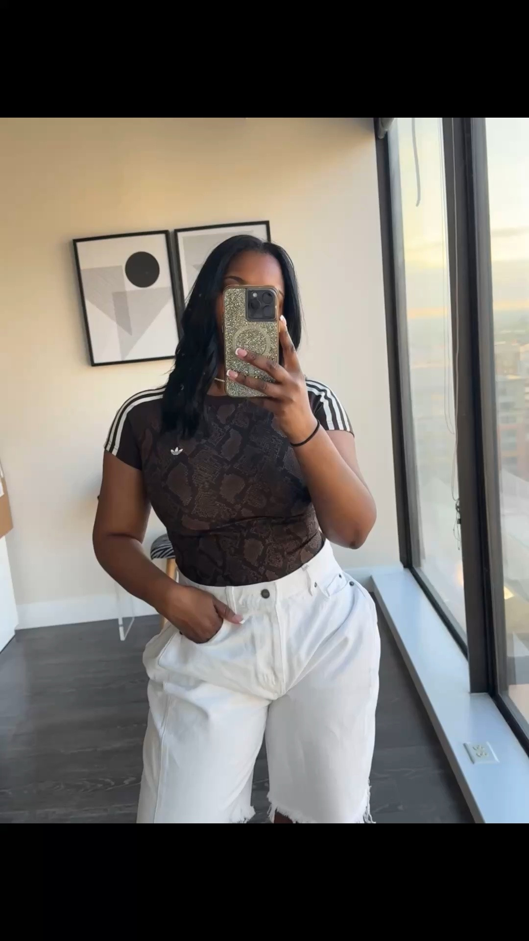 This snakeskin print adidas top is a must have and with the right bottom it makes for the perfect summer outfit. I styled it with some white Bermuda shorts.  Wearing a size XS in the top and a size 6 in the shorts. 

#outfitinspo #ltkstyle

#LTKootd