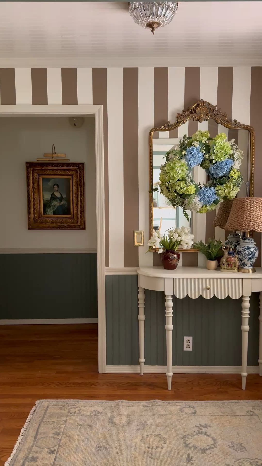 My entryway console table is currently on sale. The scallop detail and quality is 10/10. Or ate gold mirror, spring hydrangea wreath, crystal flushmount light, wool rug, rattan scallop wicker lampshade 

#LTKSeasonal #LTKHome #LTKSaleAlert
