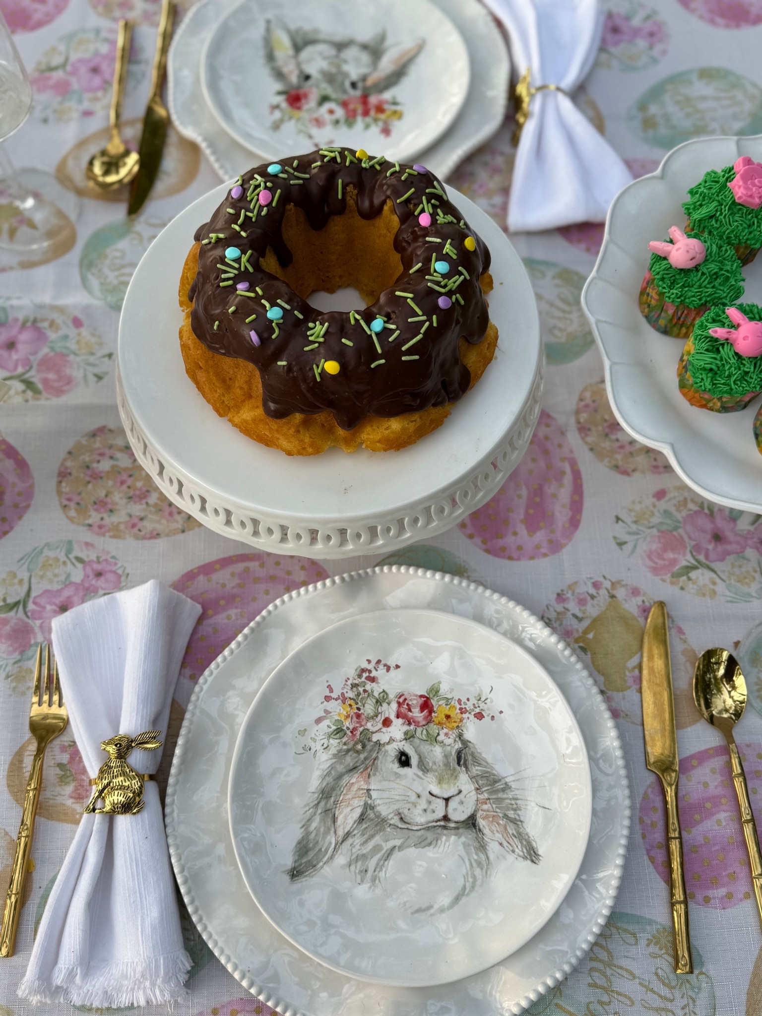 I love this beautiful Easter tablescape idea! This timeless Easter egg tablecloth has been a favorite for years and these Easter bunny plates are a must! I love the adorable flower crowns! 💗💐🐰

#LTKdayinmylife #LTKHome #LTKSeasonal