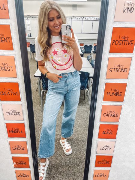 teacher Friday casual outfit!
Smiley tee: wearing men’s small
Jeans: true to size
Sandals: size down half

| teacher outfit | teacher fashion | teacher style | teacher tees | work outfit | Friday outfit

#LTKunder50 #LTKBacktoSchool #LTKSeasonal