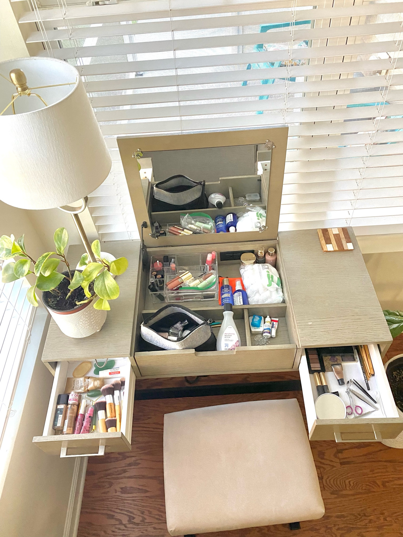 This doubles as a working desk or a bedroom #vanity 😊. I keep it by my family room window for maximum natural lighting (there isn’t a light built in). 

It’s nice because I can do my makeup without waking anyone up, but it doesn’t have a vanity “look” - it looks great as a regular desk with my furniture. 

The #bench and vanity #desk come as a set, so they match perfectly.

The wood is a light, neutral tone and the bench fabric is a #beige suede. 

#Assembly was extremely easy!

#furniture #home #homedecor #makeup #organization #mirror #wayfair

#LTKbeauty #LTKhome #LTKfamily