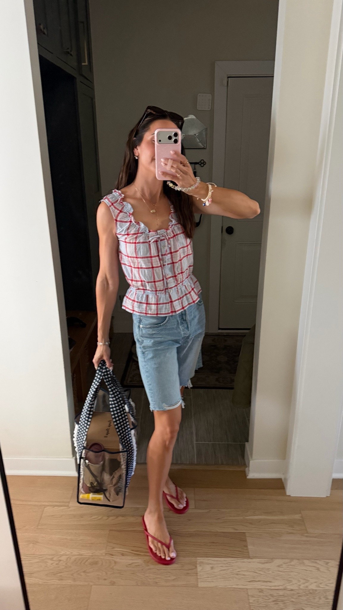 Kicking off 4th of July weekend and headed to the cabin! 🇺🇸 
Plaid top is 40% off - wearing my true size S
Long denim shorts AKA jorts 😜 true to size (26) 
Flip flops: size up for half sizes

#LTKootd #LTKSaleAlert #LTKSeasonal