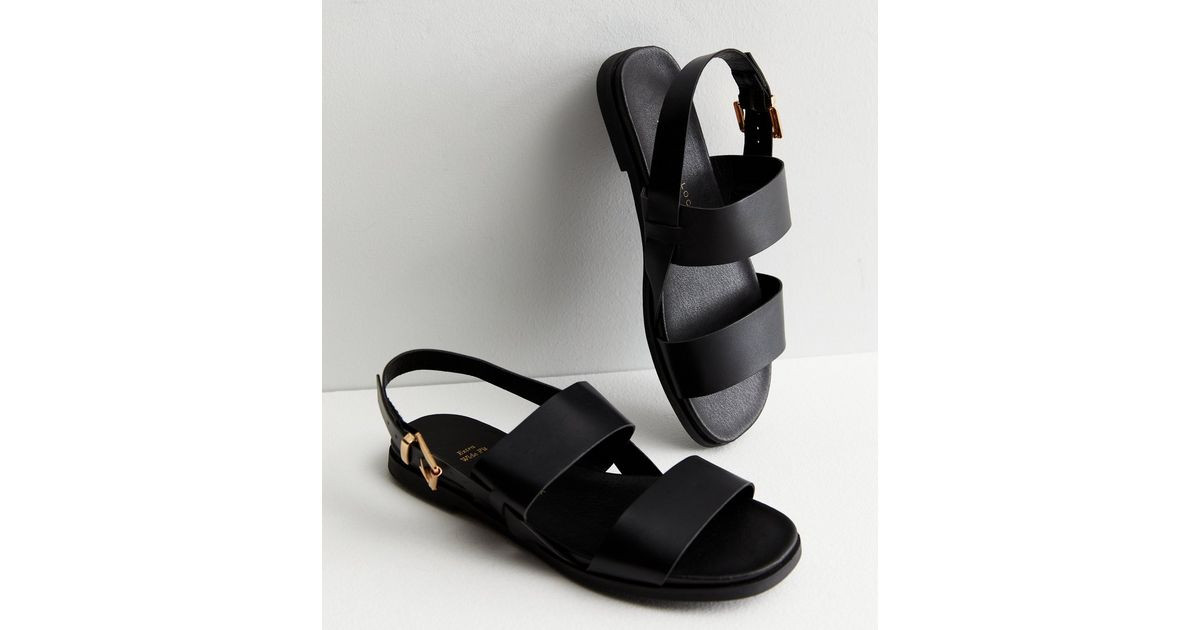 Extra Wide Fit Black Leather-Look Footbed Sandals
						
						Add to Saved Items
						Remove fr... | New Look (UK)