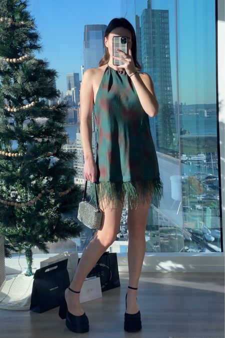Holiday outfits TikTok: dress is unfortunately sold out (google: weworewhat halter foliage dress and some might pop up) linked similar options 

#LTKsalealert #LTKstyletip #LTKSeasonal